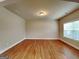 Bright living room featuring hardwood floors and natural light at 330 Bentleigh Station Dr, Acworth, GA 30101