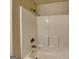 This bathroom features a white shower tub combo and a brushed nickel shower head at 330 Bentleigh Station Dr, Acworth, GA 30101