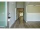 Entryway showcasing hardwood floors and views of the adjacent room with a fireplace at 214 Wet Wood Ct # 26, Fairburn, GA 30213