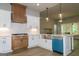 Modern kitchen with stainless steel appliances, a breakfast bar, and an open layout at 214 Wet Wood Ct # 26, Fairburn, GA 30213
