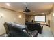 Basement home theater room with plush seating and a large screen for immersive entertainment at 2390 Colchester Ct, Cumming, GA 30041