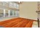 Bright living room boasts a stone fireplace, high ceilings and a wall of windows allowing natural light at 2390 Colchester Ct, Cumming, GA 30041