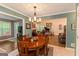 Open concept dining area that flows into the living room, perfect for entertaining guests at 30 Joe Lee Dr, Sharpsburg, GA 30277