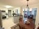 Cozy kitchen and dining area with easy access to the living room at 30 Joe Lee Dr, Sharpsburg, GA 30277