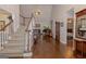 Inviting living room featuring hardwood floors, a fireplace, and abundant natural light at 30 Joe Lee Dr, Sharpsburg, GA 30277