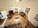 Spacious living room boasts a cozy fireplace, hardwood floors, and multiple guitars at 30 Joe Lee Dr, Sharpsburg, GA 30277