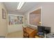 Bright home office with built-in shelving and a large window at 30 Joe Lee Dr, Sharpsburg, GA 30277