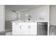 Spacious kitchen island with granite countertop, stainless steel dishwasher, and modern faucet at 3402 Arabian Farm Ln, Dacula, GA 30019
