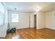 Empty bedroom features hardwood floors, a ceiling fan, closet, and natural lighting at 2201 Valley Creek Cir, Snellville, GA 30078