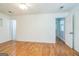 This room has hardwood floors and multiple doorways, perfect for entertaining at 2201 Valley Creek Cir, Snellville, GA 30078