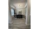 An elegant dining room featuring tray ceilings and modern chandelier at 3006 Fairway Dr, Villa Rica, GA 30180