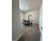 A quaint dining room with carpet and a round table set at 3006 Fairway Dr, Villa Rica, GA 30180