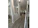 Inviting foyer with views into the living and dining spaces featuring elegant flooring and neutral paint at 3006 Fairway Dr, Villa Rica, GA 30180