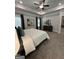 Bright main bedroom with trey ceilings, ceiling fan, soft carpet, and a sophisticated ensuite entrance at 3006 Fairway Dr, Villa Rica, GA 30180