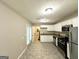 Efficient kitchen with stainless steel appliances, granite countertops, and ample cabinet space at 6309 Wellington Way, Austell, GA 30106
