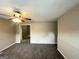 Spacious living room with neutral color walls and carpeted floors, ready for personalization at 6309 Wellington Way, Austell, GA 30106