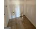 Unfinished bathroom featuring rough plumbing and open space at 242 Old Jackson Rd, Mcdonough, GA 30252
