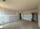 Unfinished bedroom with multiple doors offering flexibility and access within the home's layout at 242 Old Jackson Rd, Mcdonough, GA 30252