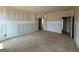 Spacious bedroom featuring unfinished walls and multiple doors, providing customization and easy access throughout at 242 Old Jackson Rd, Mcdonough, GA 30252