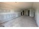 Large unfinished bonus room featuring neutral walls and multiple doorways at 242 Old Jackson Rd, Mcdonough, GA 30252