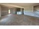 Spacious living area with unfinished walls, light-filled windows, and an open floor plan at 242 Old Jackson Rd, Mcdonough, GA 30252