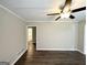 A cozy living room with hardwood floors and a ceiling fan at 2215 Rosewood Rd, Decatur, GA 30032