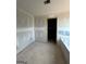 Unfinished bathroom featuring neutral walls, tub, and open doorway at 252 Old Jackson Rd, Mcdonough, GA 30252