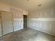 A view of the unfinished bedroom with visible framing and awaiting finishing touches at 252 Old Jackson Rd, Mcdonough, GA 30252