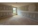 Bedroom features a window with great sunlight and unfinished construction at 252 Old Jackson Rd, Mcdonough, GA 30252