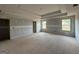 Large unfinished bedroom with abundant natural light from multiple windows at 252 Old Jackson Rd, Mcdonough, GA 30252