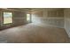 Unfinished bedroom with abundant natural light from multiple windows at 252 Old Jackson Rd, Mcdonough, GA 30252