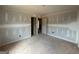 A view of the unfinished bedroom with visible framing and awaiting finishing touches at 252 Old Jackson Rd, Mcdonough, GA 30252