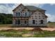 New two-story home with newly installed windows and wrapped in Tech-Wrap at 252 Old Jackson Rd, Mcdonough, GA 30252