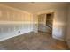 Unfinished room with doorway to stairs, offering potential for versatile use and design at 252 Old Jackson Rd, Mcdonough, GA 30252