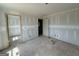 Bedroom with a walk-in closet and doorway to another room, ready to customize at 1916 King Mill Rd, Mcdonough, GA 30252