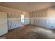 Large bedroom with ensuite bathroom access and walk-in closet at 1916 King Mill Rd, Mcdonough, GA 30252