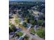 Aerial view of a residential neighborhood with mature trees and well-maintained homes at 421 Old Ivy Path, Mcdonough, GA 30253