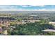 Panoramic aerial shot revealing vast landscape of trees and nestled residential area under a blue sky at 4760 Highside Way, Smyrna, GA 30082