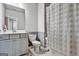 Bathroom featuring a vanity with sink, toilet, and shower, offering a clean and functional space at 4760 Highside Way, Smyrna, GA 30082