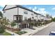 Rear view of modern townhomes featuring balconies and garages at 4760 Highside Way, Smyrna, GA 30082