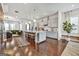 Spacious kitchen with a large island, modern appliances, hardwood floors, and seamless flow into the living area at 4760 Highside Way, Smyrna, GA 30082