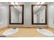 Bathroom featuring a double sink vanity and tiled floors at 4820 Yeager Rd, Douglasville, GA 30135