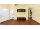 Open-concept foyer with hardwood floors, shelving and storage at 4820 Yeager Rd, Douglasville, GA 30135