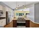 Spacious kitchen island with oven and cooktop with stainless steel refrigerator and dark countertops at 4820 Yeager Rd, Douglasville, GA 30135