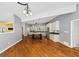 Spacious kitchen features stainless steel appliances, a center island with cooktop, and hardwood floors at 4820 Yeager Rd, Douglasville, GA 30135