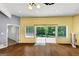 Inviting living room with hardwood floors and sliding glass doors to the deck at 4820 Yeager Rd, Douglasville, GA 30135