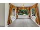 Bright sunroom featuring large windows with views of the outdoors, making it ideal for relaxation at 4820 Yeager Rd, Douglasville, GA 30135