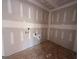 Unfinished bathroom shows plumbing fixtures and a cement floor at 1936 King Mill Rd, Mcdonough, GA 30252