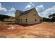 New construction home featuring siding, black roof, and windows surrounded by a spacious yard at 1936 King Mill Rd, Mcdonough, GA 30252