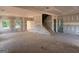 Unfinished living room showcases a spacious layout, natural light, and staircase at 1936 King Mill Rd, Mcdonough, GA 30252